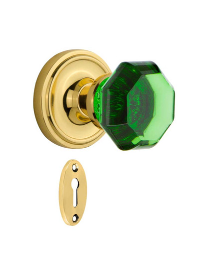 Classic Rosette Mortise Lock Set with Colored Waldorf Crystal Glass Knobs Emerald in Polished Brass.